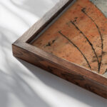 Adam and Little Eve 1921 Paul Klee close up dark wood mockup