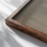 Along the Shore Hercules Brabazon Brabazon close up dark wood mockup