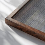 Athletes Head 1932 Paul Klee close up dark wood mockup