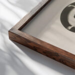 Behind the Back of the Gods 1928 Laszlo Moholy Nagy close up dark wood mockup