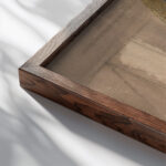 Bomber Lair – Egg and Fin 1940 Paul Nash close up dark wood mockup