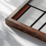 Composition in White Red and Yellow 1936 Piet Mondrian close up dark wood mockup