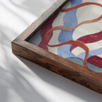 Decoratief ontwerp met letter W 1874 Carel Adolph Lion Cachet close up dark wood mockup