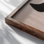 Die Nabelflasche 1923 Kurt Schwitters close up dark wood mockup