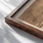 Die Pfluger 1907 Kathe Kollwitz close up dark wood mockup