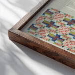 Drie decoratieve ontwerpen 1874 Carel Adolph Lion Cachet close up dark wood mockup