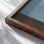 Embrace 1936 Cyprian Majernik close up dark wood mockup