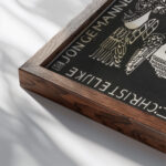 Ex libris van Christelijke Jongemannen Vereeniging Excelsior 1916 Carel Adolph Lion Cachet 1 close up dark wood mockup