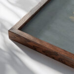 From Down the Bay Fred Wagner close up dark wood mockup