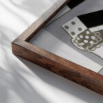 Guitar Book and Newspaper 1920 Juan Gris close up dark wood mockup