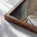 Hand Sewing Machine 1927 Arthur Dove close up dark wood mockup