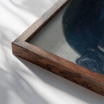 Head Pierced with Arrows from the Los teules series 1947 Jose Clemente Orozco close up dark wood mockup