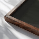 Het luchtschip Belgique II in zijn loods 1910 Leon Spilliaert close up dark wood mockup