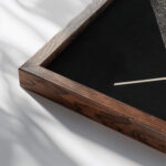 Konstruktion V 1923 Laszlo Moholy Nagy close up dark wood mockup