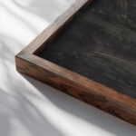 Krajina s tovarnou lino 1940–1944 Jan Novak close up dark wood mockup