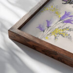 Large feather like leaf formation in black green purple and gold late 19th century Unknown close up dark wood mockup