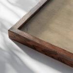 Lighting Up Joseph Pennell close up dark wood mockup