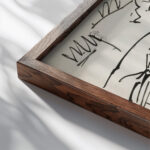 Man zittend met zijn hand achter het hoofd 1919 08 Reijer Stolk close up dark wood mockup