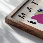 Matisse TheKnifeThrower 1947.png mockup0 v3 close up dark wood mockup