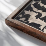 Ontwerp voor boekband voor Insulinde door D. Wouters en J. van Hulzen 1874 Carel Adolph Lion Cachet close up dark wood mockup