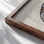 Ontwerp voor een gedenkbord met W en een wapenschild 1874 Carel Adolph Lion Cachet close up dark wood mockup