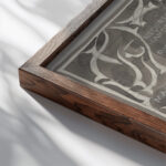 Ornamentaal ontwerp met namen van bedrijven 1874 Carel Adolph Lion Cachet close up dark wood mockup