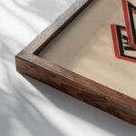 Propaganda Stand Workers of the World Unite 1922 Gustav Klutsis close up dark wood mockup