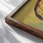 Ptaki 1947 Marian Kopf close up dark wood mockup Ptaki 1947 Marian Kopf close up dark wood mockup