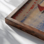 Red Sailing Ship and Gondola Jules Schmalzigaug close up dark wood mockup