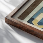 Romaans bandmotief met vlechtwerk c. 1890 c. 1922 Johanna van de Kamer close up dark wood mockup