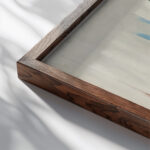 Rooftops and Trees 1918 Charles Demuth close up dark wood mockup