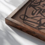 Sari Dienes a surrounding 1960 Unknown close up dark wood mockup