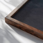 Skyscrapers at night 1910 Joseph Pennell close up dark wood mockup