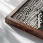 Staande vrouw in een deuropening 1919 08 Reijer Stolk close up dark wood mockup