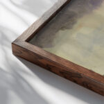 Surge during rain 1951 Arno Konig close up dark wood mockup