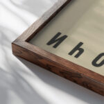 Svolochi. 1923 El Lissitzky close up dark wood mockup