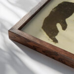 lllustration for Juliusz Slowackis Genesis from the Spirit Juliusza Slowackiego 1918 Jerzy Hulewicz close up dark wood mockup