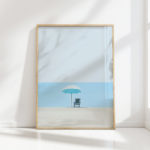 serene beach umbrella chair coastal scene print