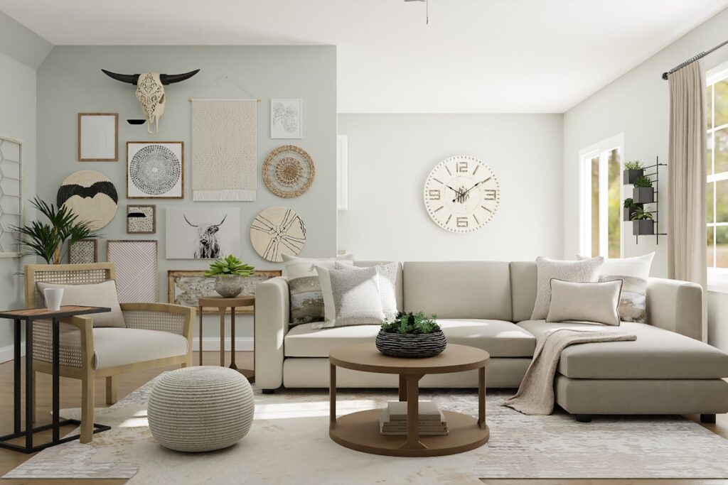 Boho living room with a mixed gallery wall of macramé hanging, woven baskets, a decorative cow-skull piece, and a large round wall clock above a cream sectional sofa.