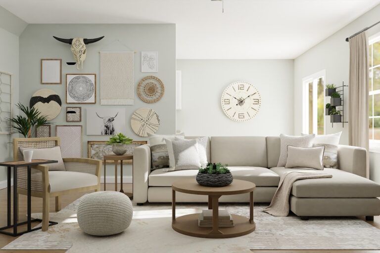 Boho living room with a mixed gallery wall of macramé hanging, woven baskets, a decorative cow-skull piece, and a large round wall clock above a cream sectional sofa.