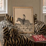 Cowgirl Riding a Zebra in the Desert Print