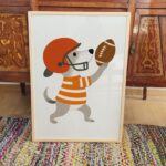 Dog Playing Football Poster