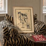Cowgirl Leaning on Her Horse in the Desert Print