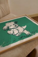 Playful Puppy Holding a Ball Line Art